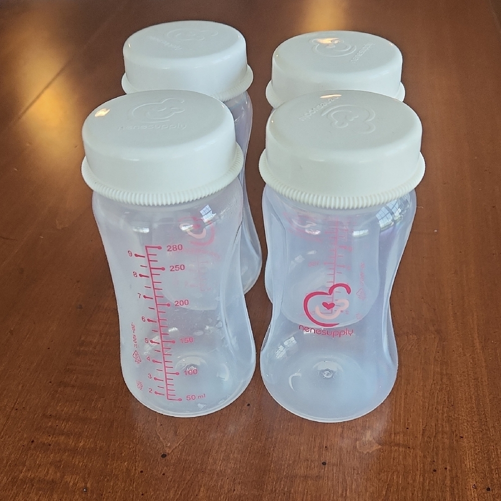 Set of 4 NENESUPPLY Clear Baby Bottles with White Caps